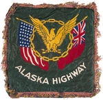 WWII “U.S. ARMED FORCES WOLF” AND “ALASKA HIGHWAY” PILLOW COVER PAIR.