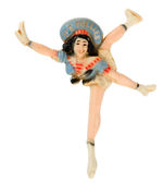 "ICE FOLLIES" MOST UNUSUAL POSE FIGURAL PLASTIC SOUVENIR PIN.