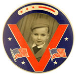 LARGE WWII VICTORY BUTTON HOLDING REAL PHOTO OF YOUNG BOY.