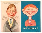 MAD-INSPIRED ALFRED E. NEWMAN-LIKE POSTCARD PAIR.