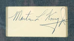 "MARTIN LUTHER KING JR." EXCEPTIONALLY LARGE SIGNATURE ON CARD CUSTOM MATTED AND FRAMED.