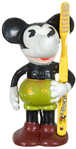 “MICKEY MOUSE” FIGURAL BISQUE TOOTHBRUSH HOLDER (COLOR VARIETY).