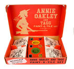 "ANNIE OAKLEY AND TAGG PAINT-A-TILE SET."