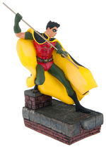 "ROBIN" STATUE BY BOWEN AND "BATGIRL" STATUE BY PAQUET.