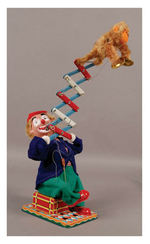 "HIGH JINKS AT THE CIRCUS CLOWN WITH HIS AERIAL PERFORMING CHIMP" BOXED BATTERY TOY.