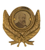 HARRISON CARDBOARD PHOTO ON ORNATE BRASS SHELL PIN.