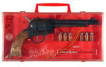 “JOHNNY EAGLE RED RIVER” CAP GUN IN DISPLAY CASE.