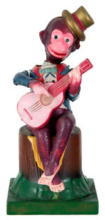 MONKEY PLAYING GUITAR CELLULOID WIND-UP.