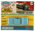 "AURORA SUPER MODEL MOTORING - '57 CHEVY COUPE" CARDED SLOT RACING CAR.