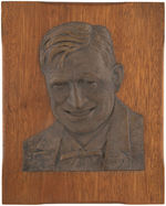 WILL ROGERS FINELY DETAILED HIGH RELIEF BRASS PORTRAIT ON WOOD.