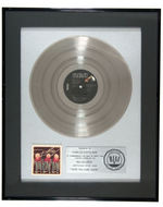 DOLLY PARTON "HERE YOU COME AGAIN" PLATINUM RECORD AWARD.