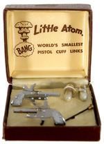 “LITTLE ATOM WORLD’S SMALLEST PISTOL CUFFLINKS” COMPLETE IN BOX.