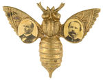 McKINLEY AND HOBART JUGATE FIXED WING EMBOSSED BRASS GOLDBUG BADGE.