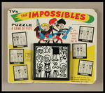 "THE IMPOSSIBLES" SLIDING SQUARES PUZZLE ON ORIGINAL CARD.