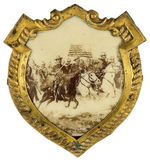 "TEDDY'S ROUGH RIDERS" OUTSTANDING CELLULOID ON BRASS SHIELD BADGE.