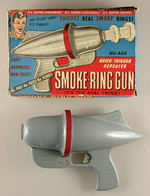 "SMOKE-RING GUN."