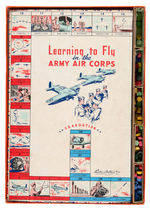 “LEARNING TO FLY” AND “AIR COMBAT TRAINER” WWII BOXED GAME PAIR.