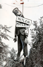 "EFFIGY OF HITLER HUNG IN STREET" NEWS SERVICE PHOTO.