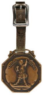 "DRINK HIRES" ROOT BEER FOB WITH LOGO BOY HOLDING MUG FROM 1915.