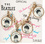 “THE BEATLES” CHARMS/HEART VARIETY PAIR OF CARDED BRACELETS.