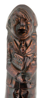 HITLER W/”MEIN KRAMP” FIGURAL CARICATURE METAL PAPERWEIGHT.