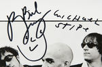 R.E.M. BAND SIGNED PUBLICITY PHOTO.