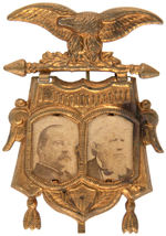 CLEVELAND/THURMAN CARDBOARD JUGATE PHOTOS IN ORNATE BRASS SHELL BADGE.