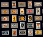 “EMBLEMS OF THE WORLD’S GREATEST AUTOMOBILES” STERLING SILVER 50 PIECE INGOT SET.