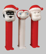 SANTA AND E.T. TEST PEZ DISPENSERS.