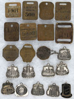 TEN BRASS CHECKS AND LUGGAGE FOBS PLUS ELEVEN KEY FOBS.