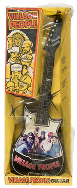 “VILLAGE PEOPLE” BOXED GUITAR.