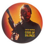 CLINT EASTWOOD AND CHUCK NORRIS PAIR OF SCARCE 1980s BUTTONS.