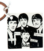 "THE BEATLES" CLOTH CLUTCH PURSE WITH TAG.