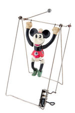 "MINNIE MOUSE TRAPEZE" BOXED CELLULOID WIND-UP.