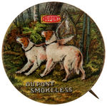 "DUPONT SMOKELESS" EARLY BUTTON SHOWING WOODED SCENE WITH DOGS, BIRD AND SHOTGUNS.