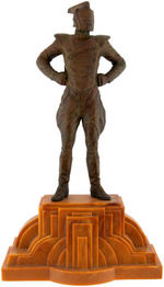 "THE ROCKETEER" BRONZE STATUE ON ART DECO BASE BY KENT MELTON.