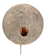 MECHANICAL PIN WITH MOVEABLE PHOTOS OF THREE POSSIBLE 1896 PRESIDENTIAL CANDIDATES.