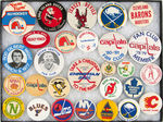 PAUL MUCHINSKY COLLECTION OF 28 HOCKEY BUTTONS.