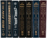 “THE COMIC BOOK PRICE GUIDE” LOT OF SEVEN LIMITED EDITION SIGNED HARDCOVERS.