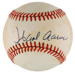 BASEBALL'S 500 HOME RUN CLUB SIGNED BASEBALL TRIO WITH HANK AARON, REGGIE JACKSON & MIKE SCHMIDT.