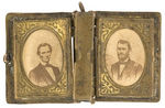 BRASS BOOK CHARM OPENS TO SHOW BEARDLESS LINCOLN & GRANT IN UNIFORM.