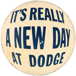 “IT’S REALLY A NEW DAY AT DODGE.” LARGE SALESMANS BUTTON.