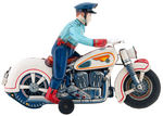 BATTERY OPERATED POLICEMAN ON MOTORCYCLE.