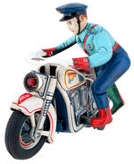 BATTERY OPERATED POLICEMAN ON MOTORCYCLE.