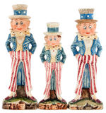 BROWNIES UNCLE SAM HIGH QUALITY MAJOLICA CANDLESTICK HOLDER & FIGURINE TRIO.