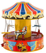 WOLVERINE MUSICAL LEVER ACTION MERRY-GO-ROUND TOY.