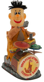 "FRED FLINTSTONE'S BEDROCK BAND" ALPS BATTERY-OPERATED TOY.