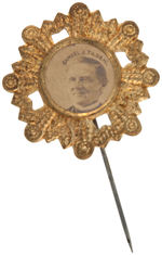 "SAMUEL J. TILDEN" CARDBOARD PHOTO ON ORNATE BRASS SHELL STICKPIN.