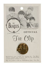 “THE BEATLES OFFICIAL TIE CLIP.”