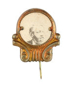 BENJAMIN HARRISON CARDBOARD PHOTO IN ORNATE BRASS SHELL FRAME WITH STICKPIN.